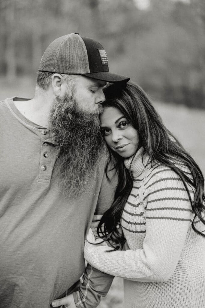 A couple sharing a quiet, intimate moment that reflects commitment and emotional connection